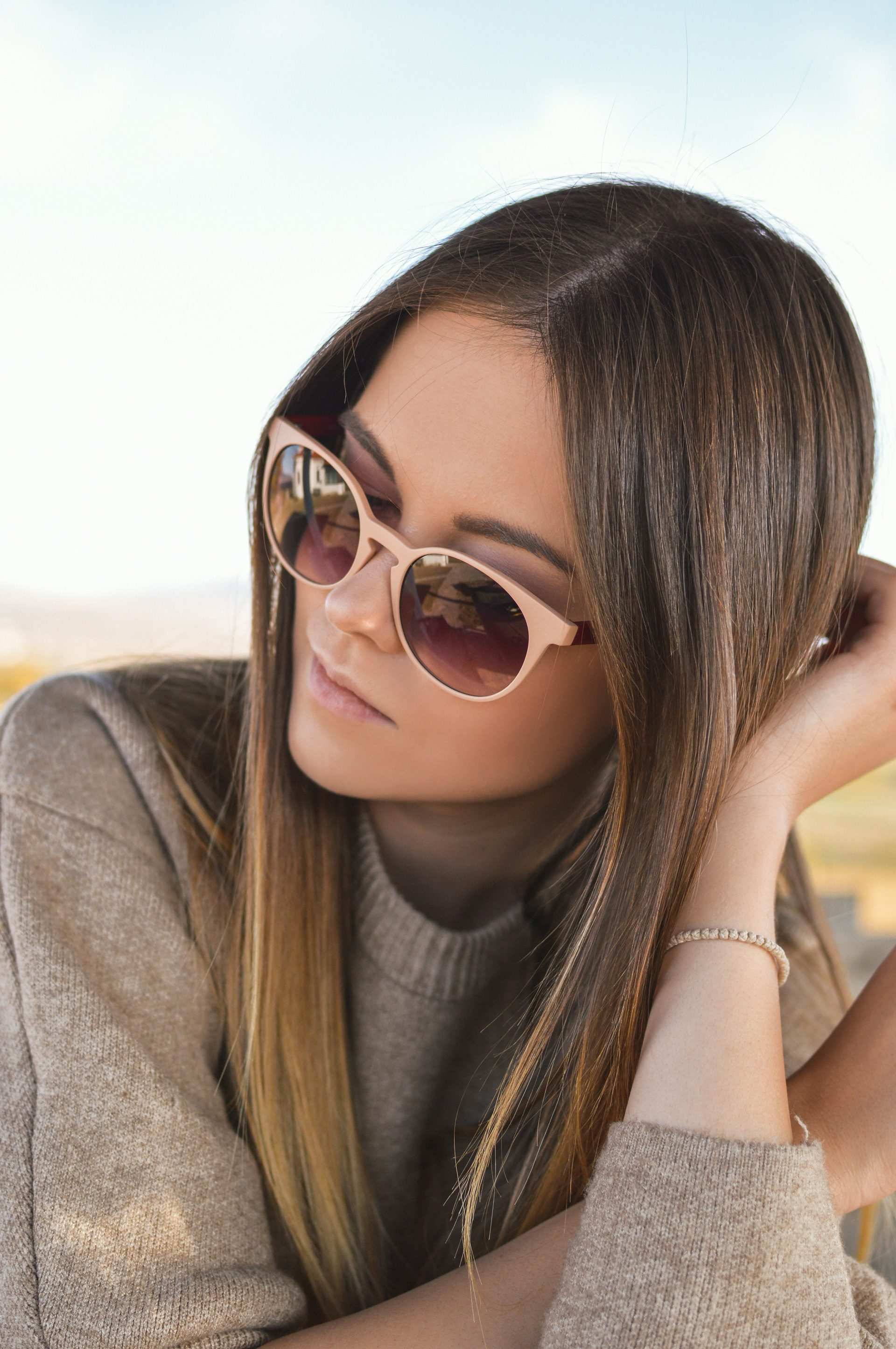 Woman wearing stylish sunglasses